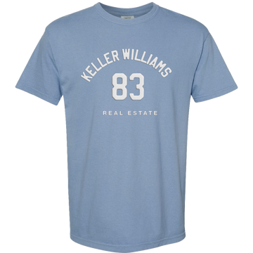 Blue t-shirt with 'Keller Williams Real Estate 83' text on a white background