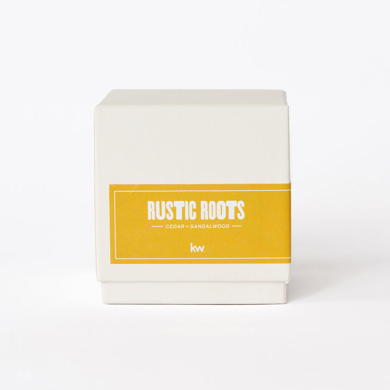 candle box with a yellow label on a white background