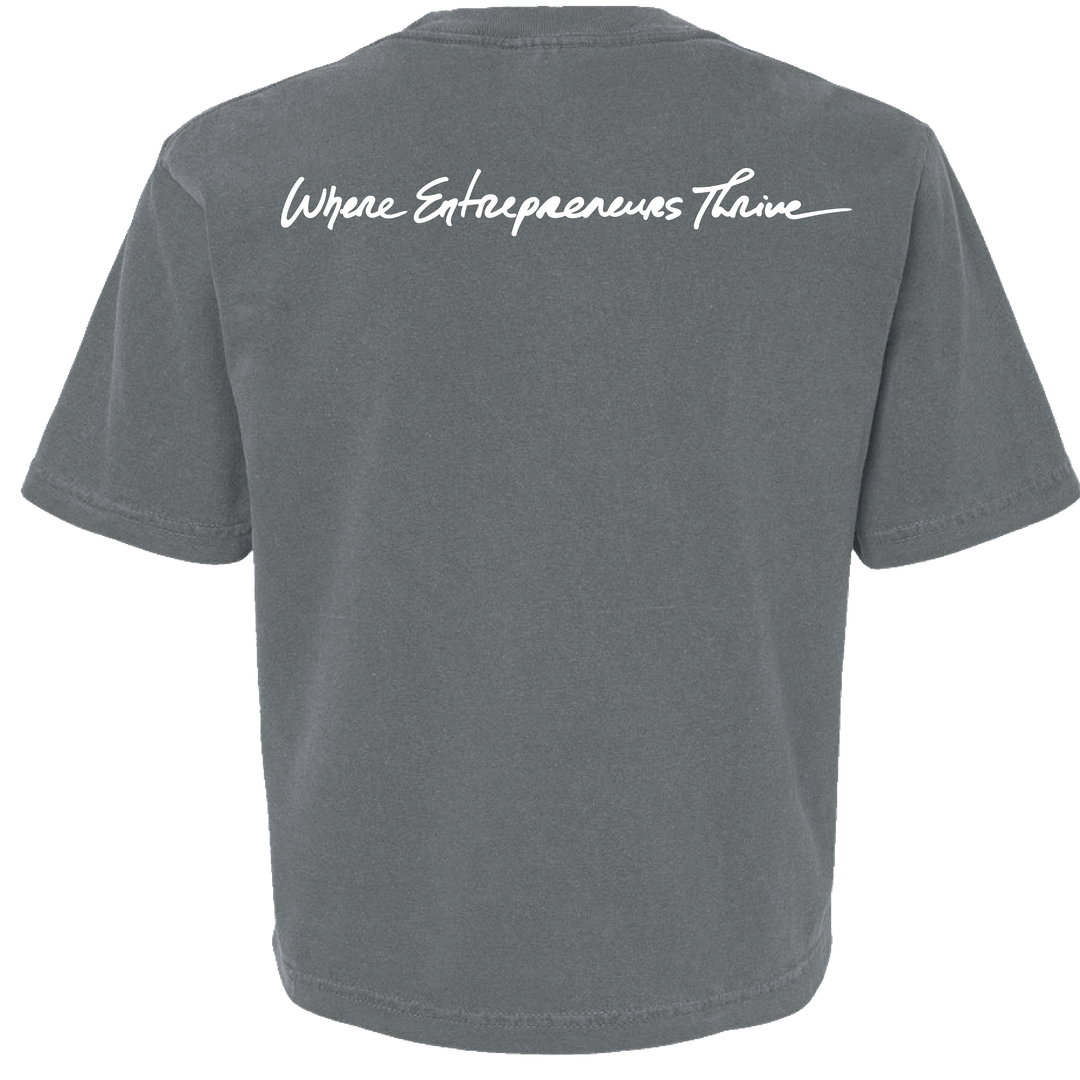 Gray t-shirt with 'Where Entrepreneurs Thrive' text on the back against a white background