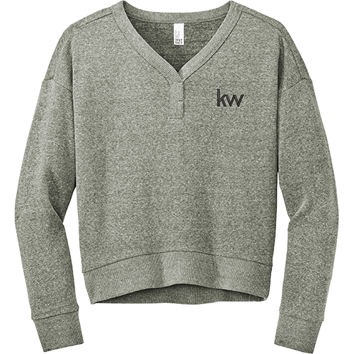 Women's pink tri-fleece v-neck sweatshirt with long sleeves and a crop fit.