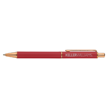 Red pen with rose gold accents on a white background, featuring 'Keller Williams' branding.
