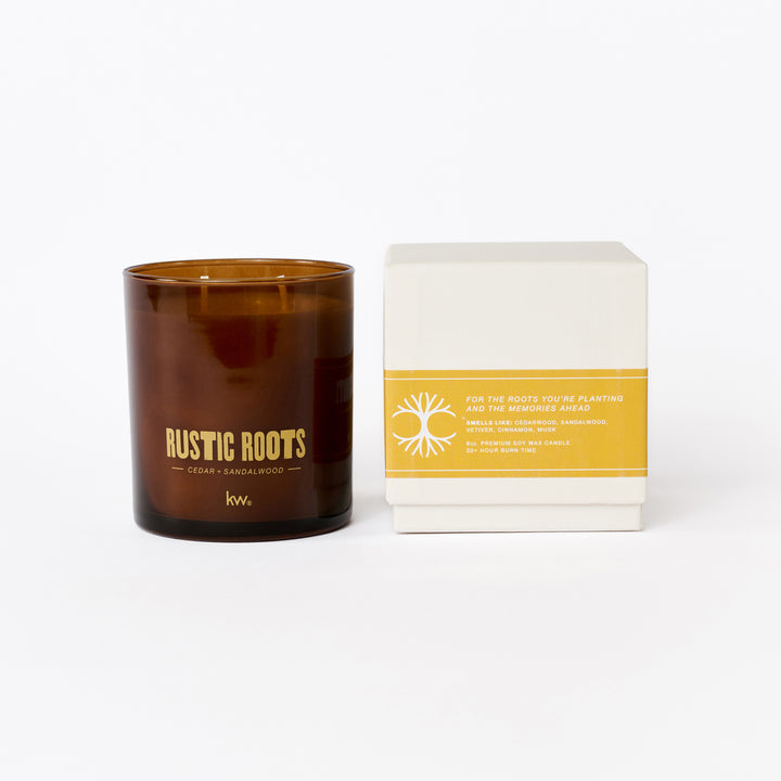 Brown candle labeled 'Rustic Roots' with a white box on a white background